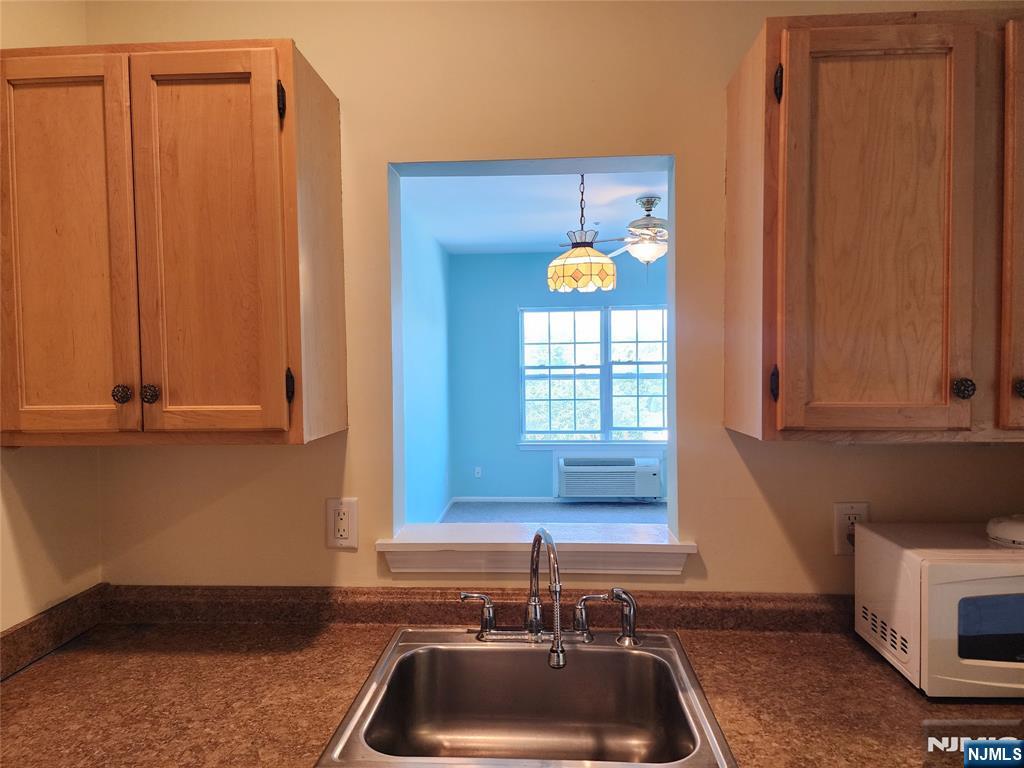 9212 Richmond Road West Milford, NJ 07480 - Photo 5 of 16 a kitchen with a sink and a window