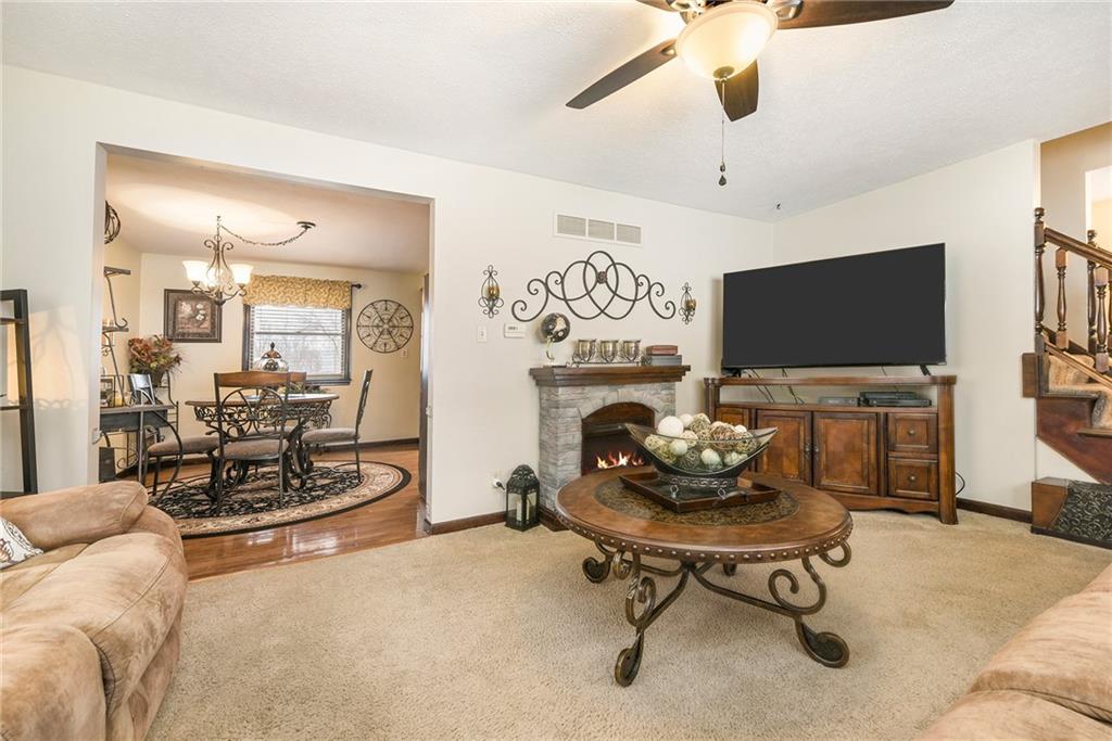262 Glade Mills Road Valencia, PA 16059 - Photo 5 of 25 a living room with furniture and a flat screen tv