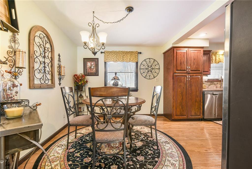 262 Glade Mills Road Valencia, PA 16059 - Photo 7 of 25 a view of a dining room with furniture and a chandelier