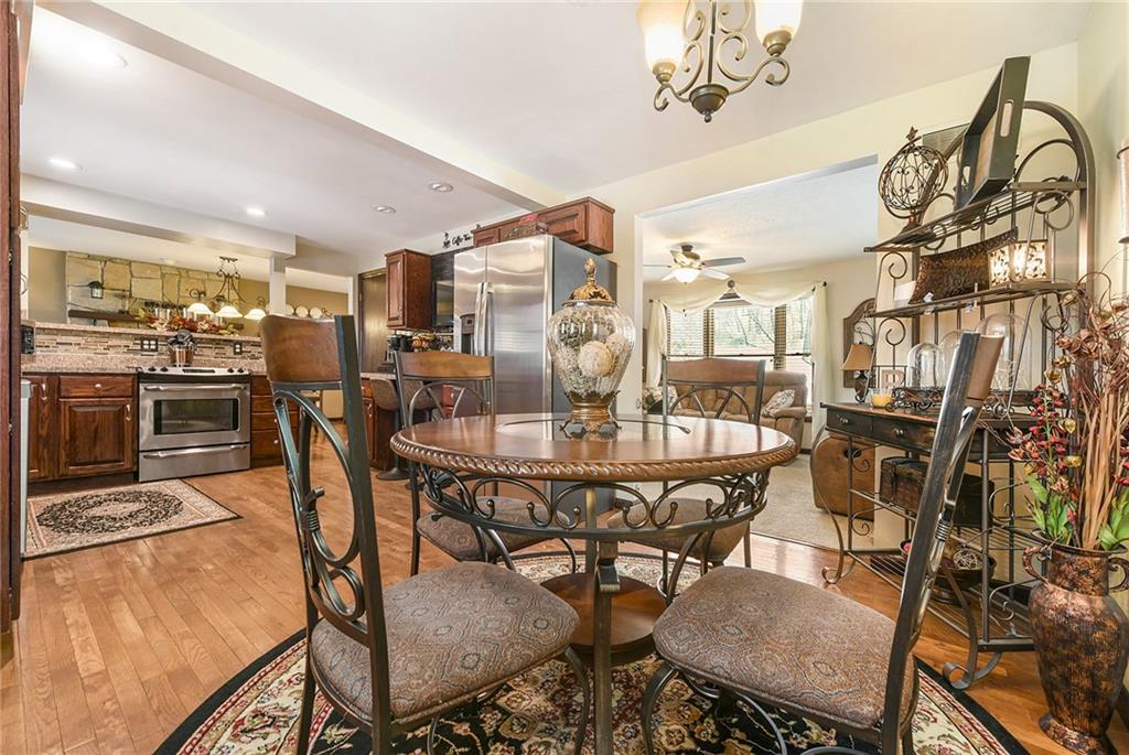 262 Glade Mills Road Valencia, PA 16059 - Photo 8 of 25 a view of a dining room with furniture and a kitchen view