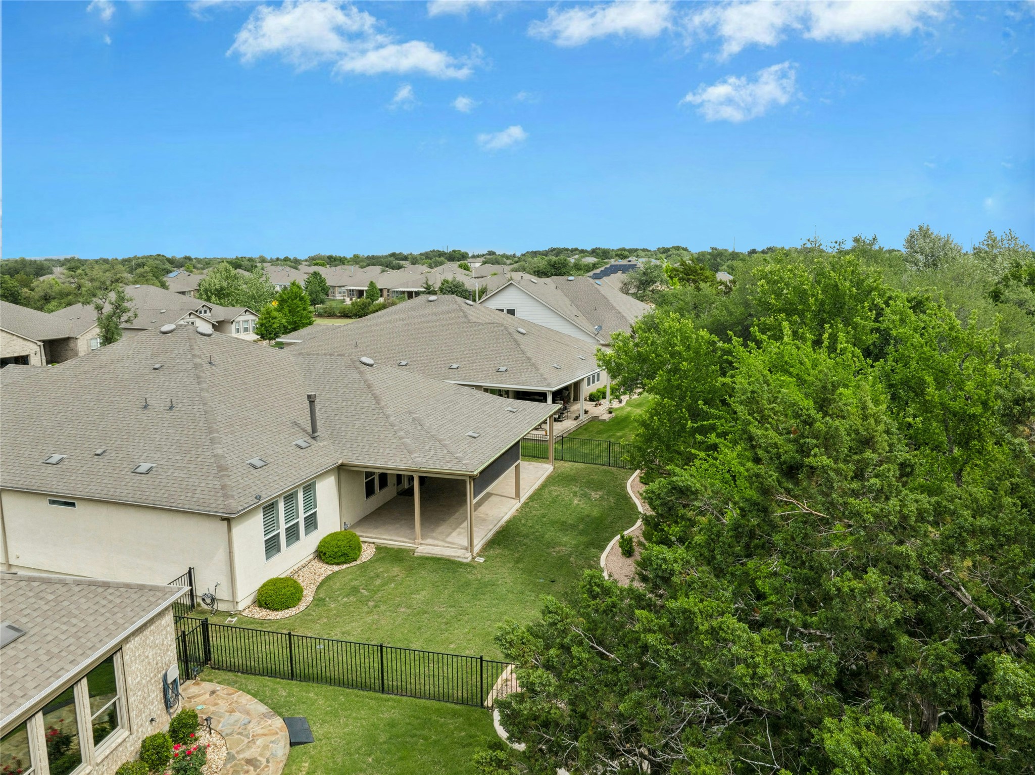 105 Marfa Cove Georgetown, TX 78633 - Photo 30 of 36 an aerial view of a house with a yard and lake view
