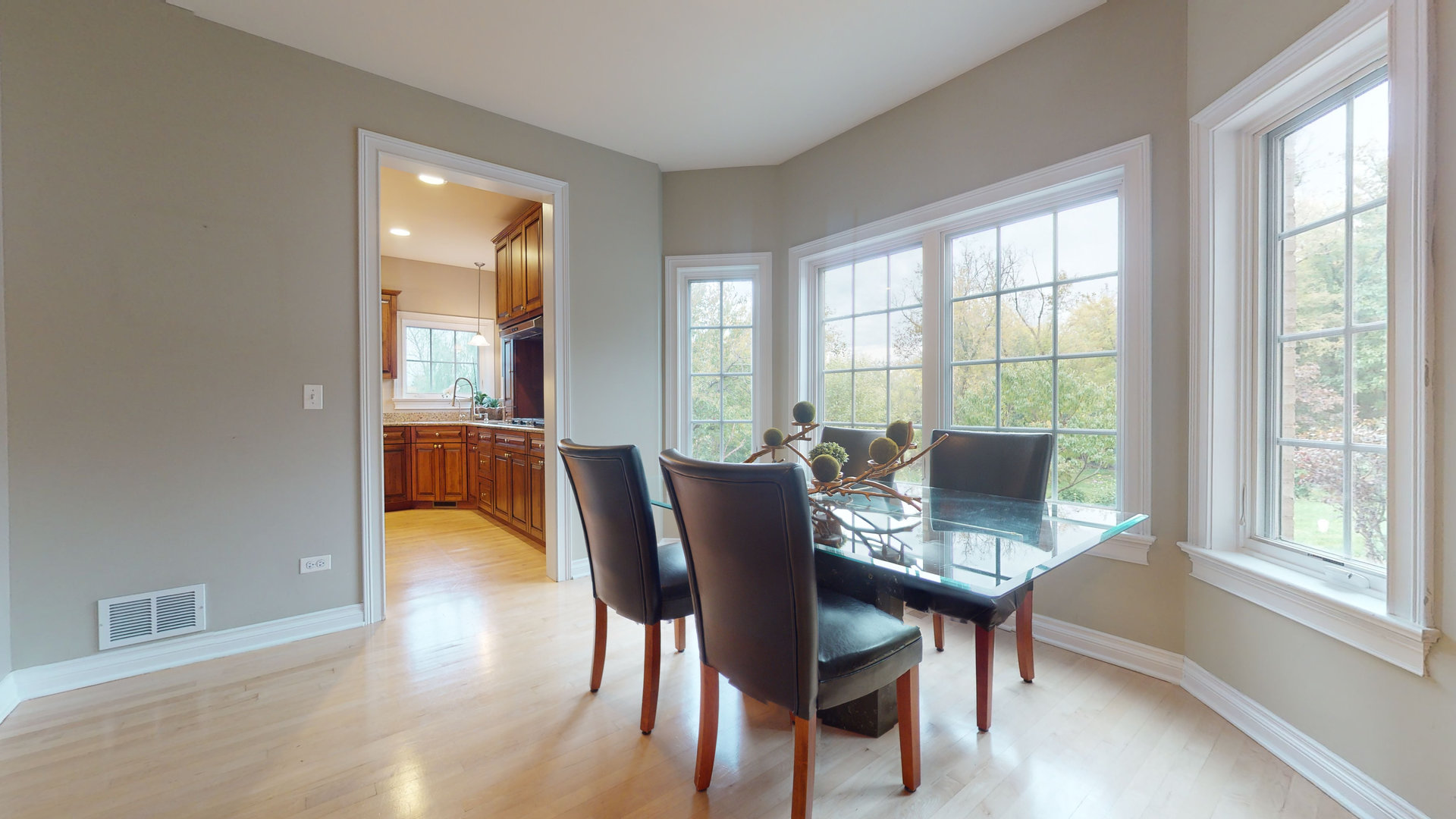 6344 Gilmer Road Long Grove, IL 60047 - Photo 16 of 43 a dining room with furniture and wooden floor
