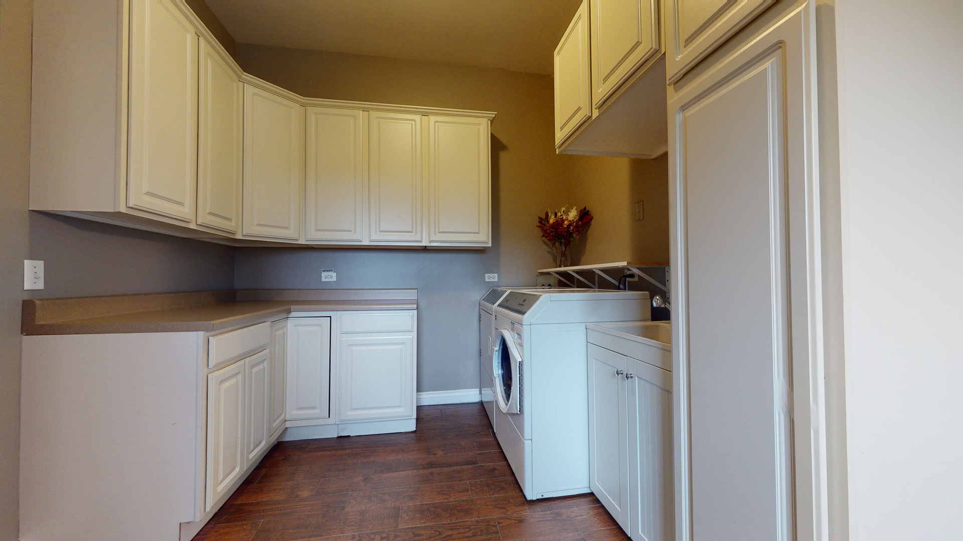 6344 Gilmer Road Long Grove, IL 60047 - Photo 17 of 43 a kitchen with white cabinets and sink