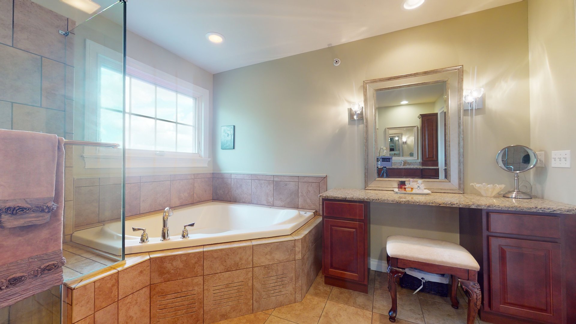 6344 Gilmer Road Long Grove, IL 60047 - Photo 21 of 43 a bathroom with a bathtub sink and mirror