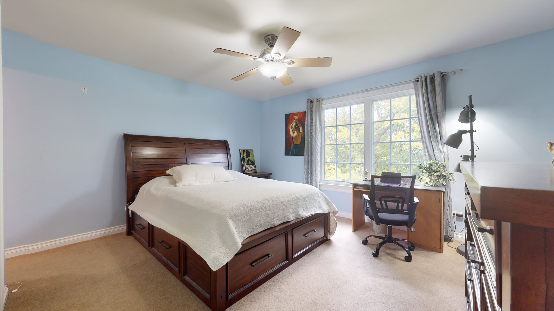6344 Gilmer Road Long Grove, IL 60047 - Photo 25 of 43 a bed room with a bed and a chandelier