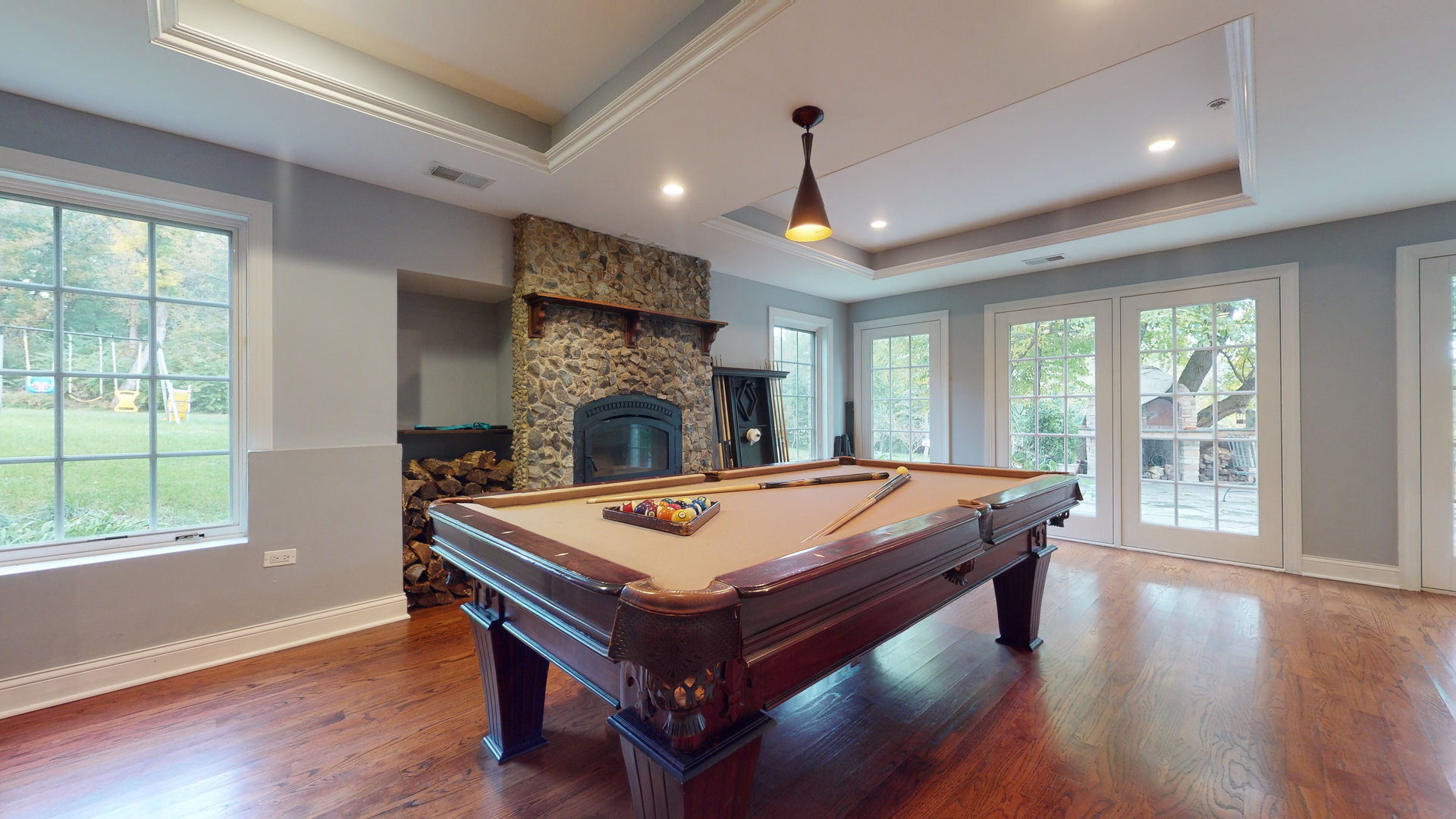 6344 Gilmer Road Long Grove, IL 60047 - Photo 30 of 43 a room with pool table windows and wooden floor