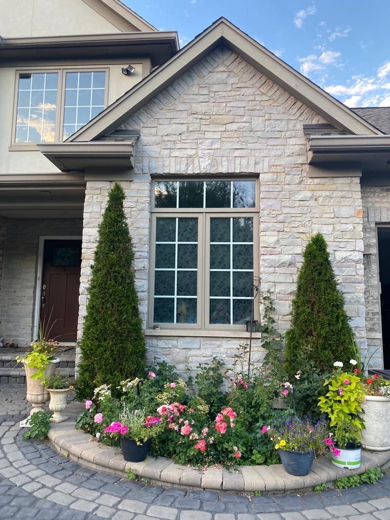 6344 Gilmer Road Long Grove, IL 60047 - Photo 3 of 43 a front view of a house with a yard and fountain