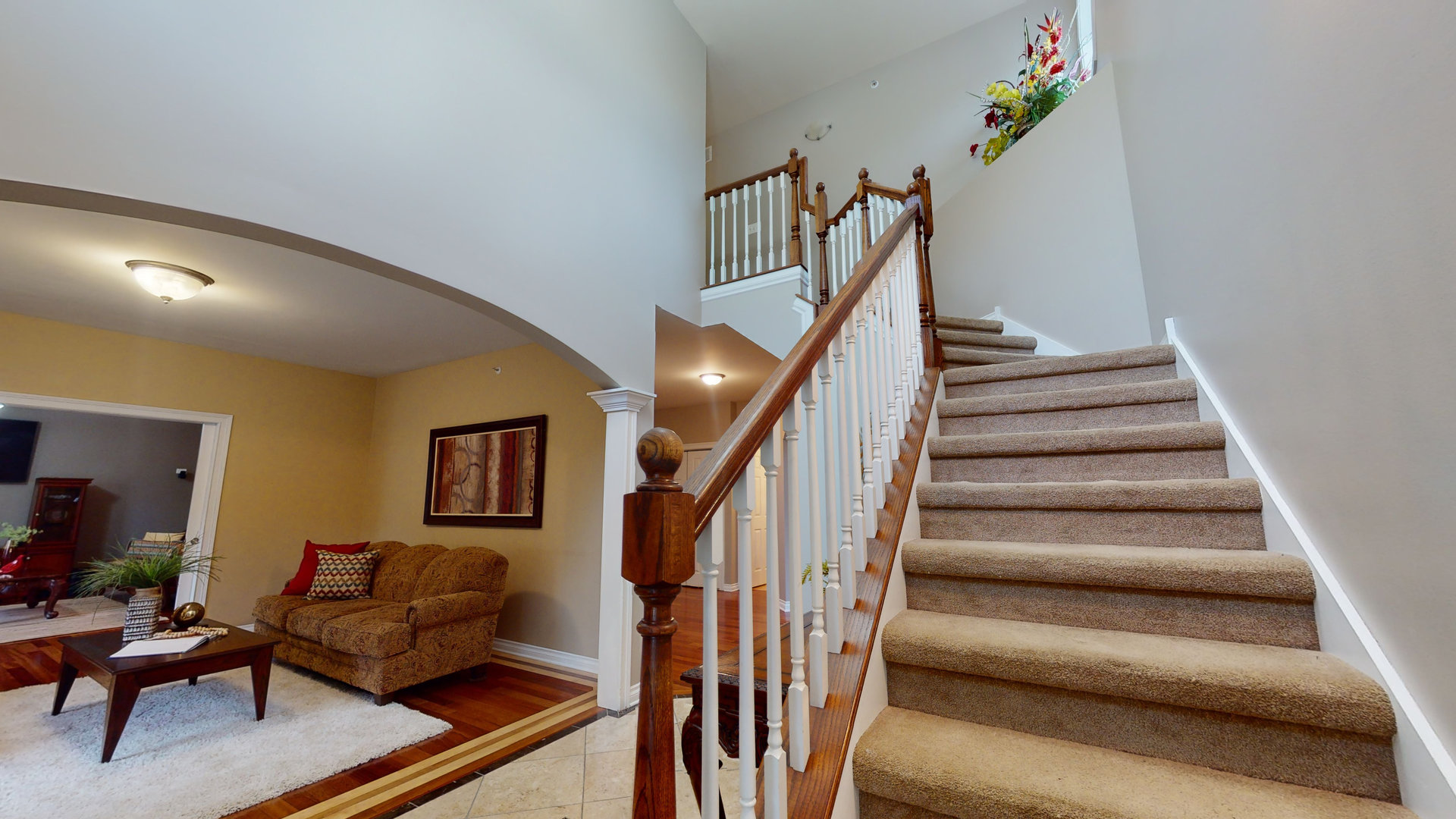 6344 Gilmer Road Long Grove, IL 60047 - Photo 6 of 43 a living room with furniture and stairs