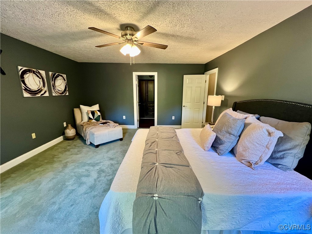 8006 Sinclair Road Mechanicsville, VA 23111 - Photo 29 of 45 Bedroom with a textured ceiling, carpet floors, an