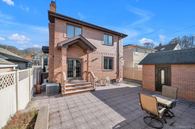 a backyard of a house with seating space