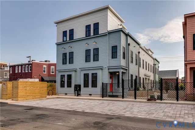 a front view of a building with a street