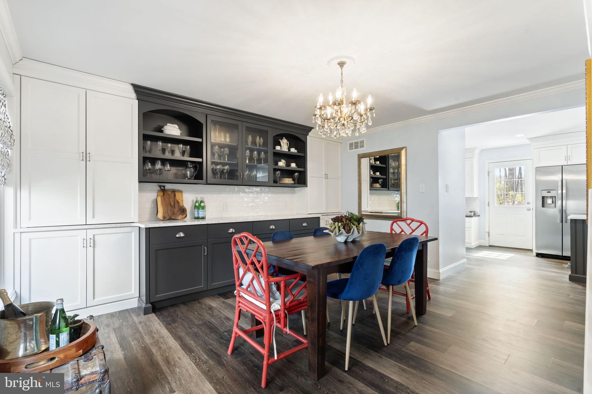 1017 Scholl Road Pottstown, PA 19465 - Photo 14 of 56 a view of a dining room with furniture and chandelier