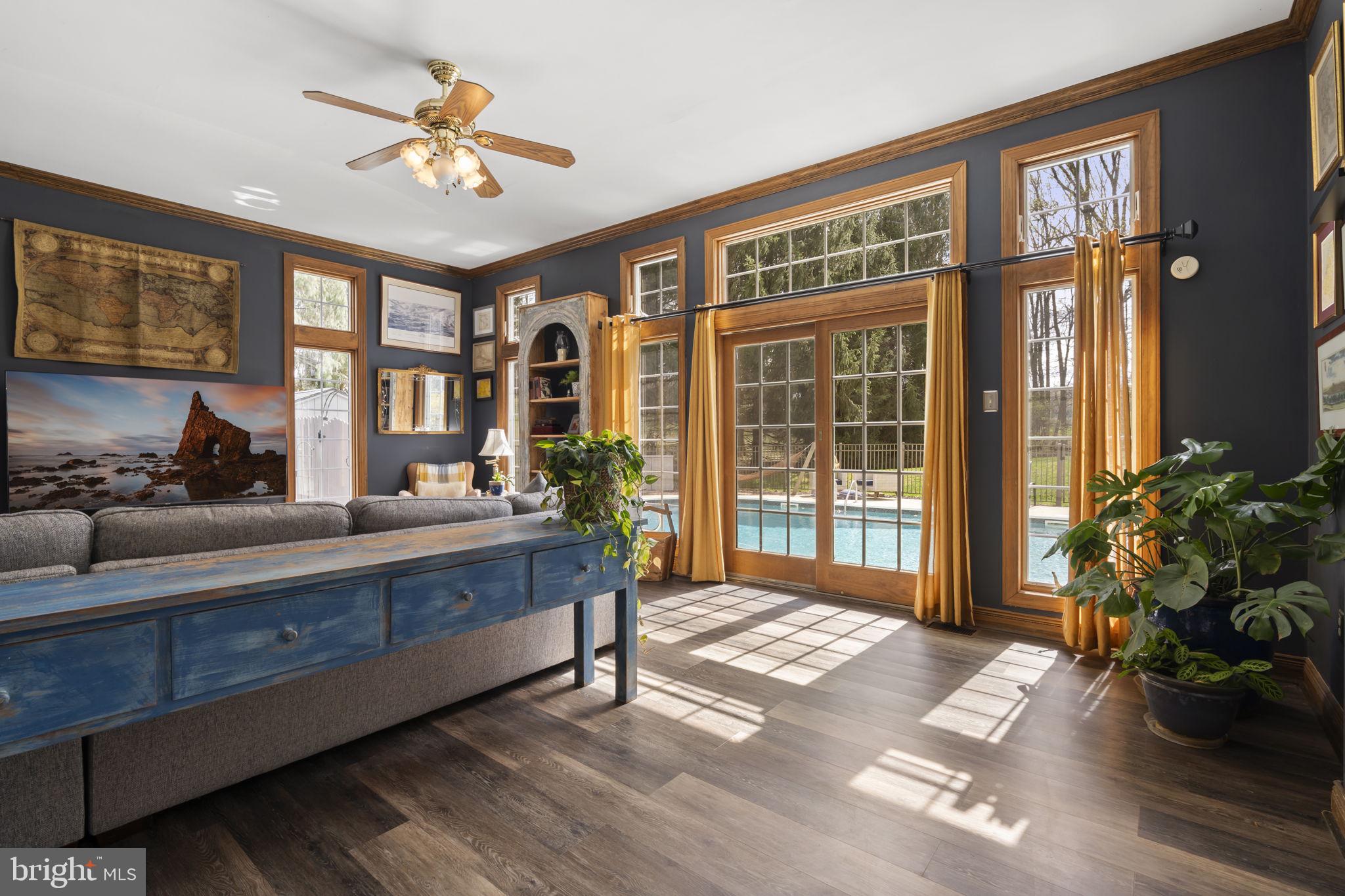 1017 Scholl Road Pottstown, PA 19465 - Photo 16 of 56 a living room with furniture and large windows