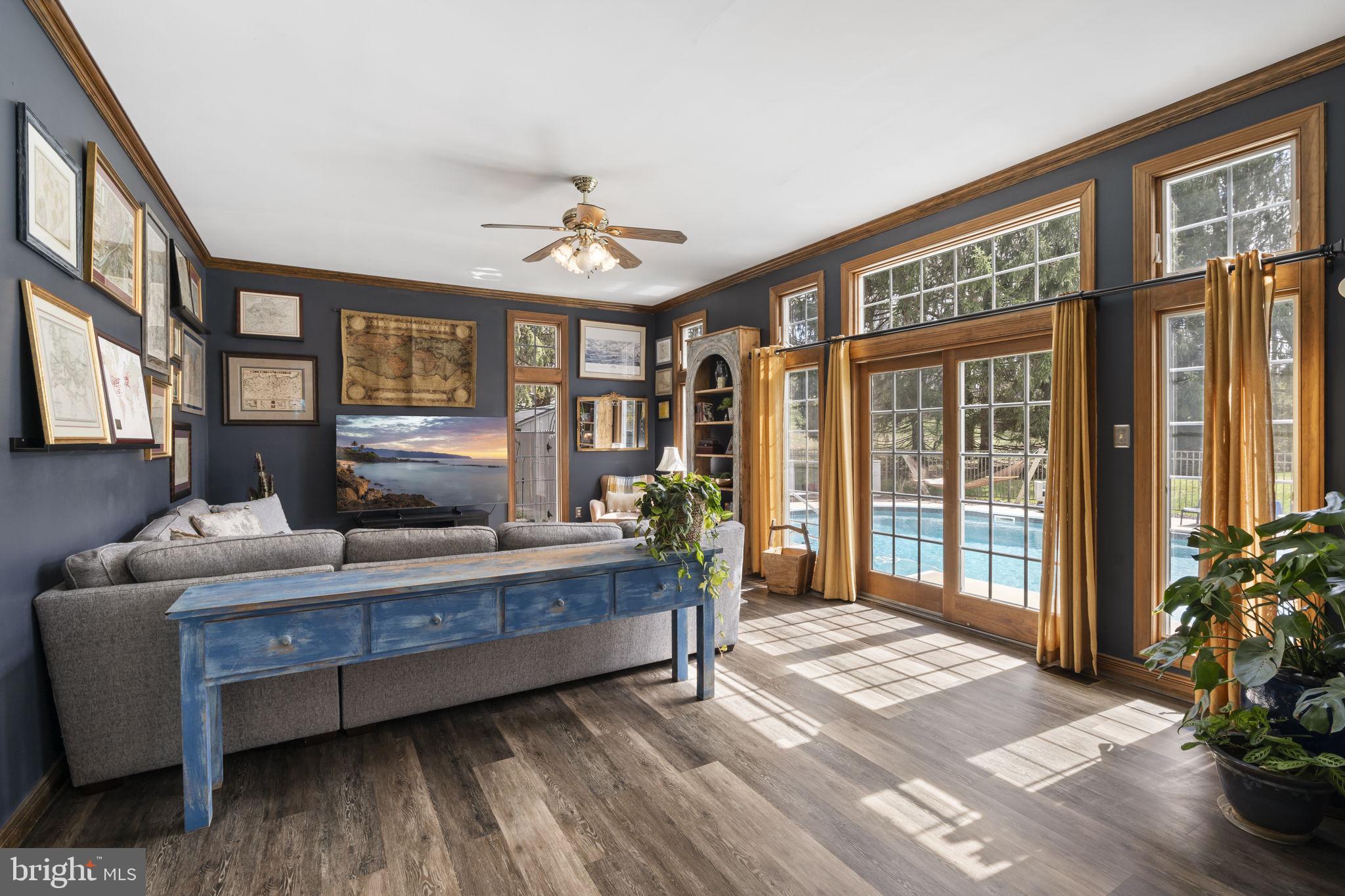 1017 Scholl Road Pottstown, PA 19465 - Photo 17 of 56 a living room with furniture and a large window