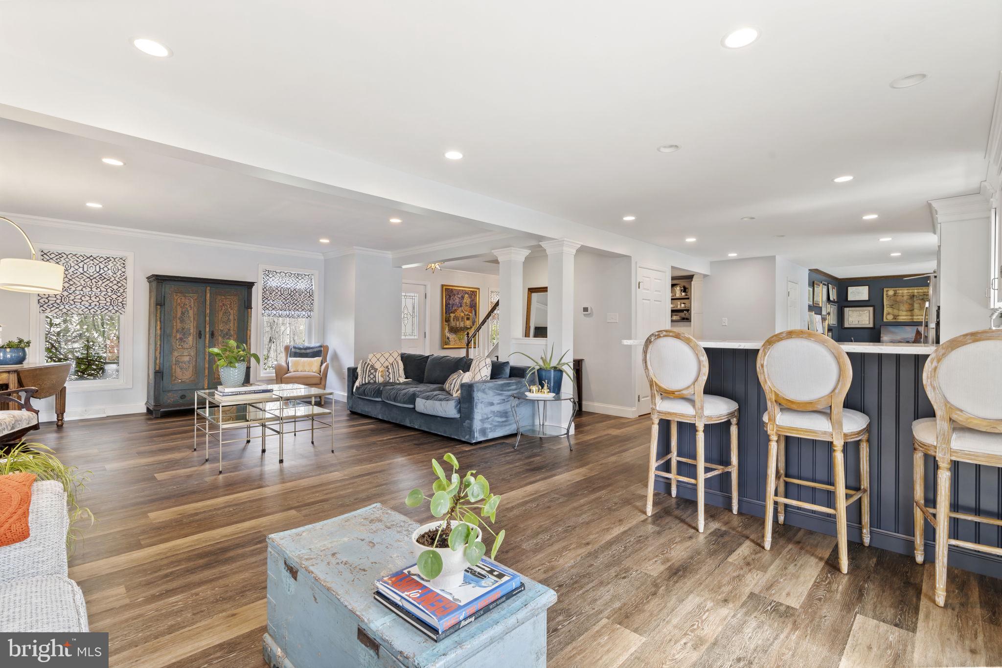 1017 Scholl Road Pottstown, PA 19465 - Photo 2 of 56 a living room with furniture kitchen view and a wooden floor