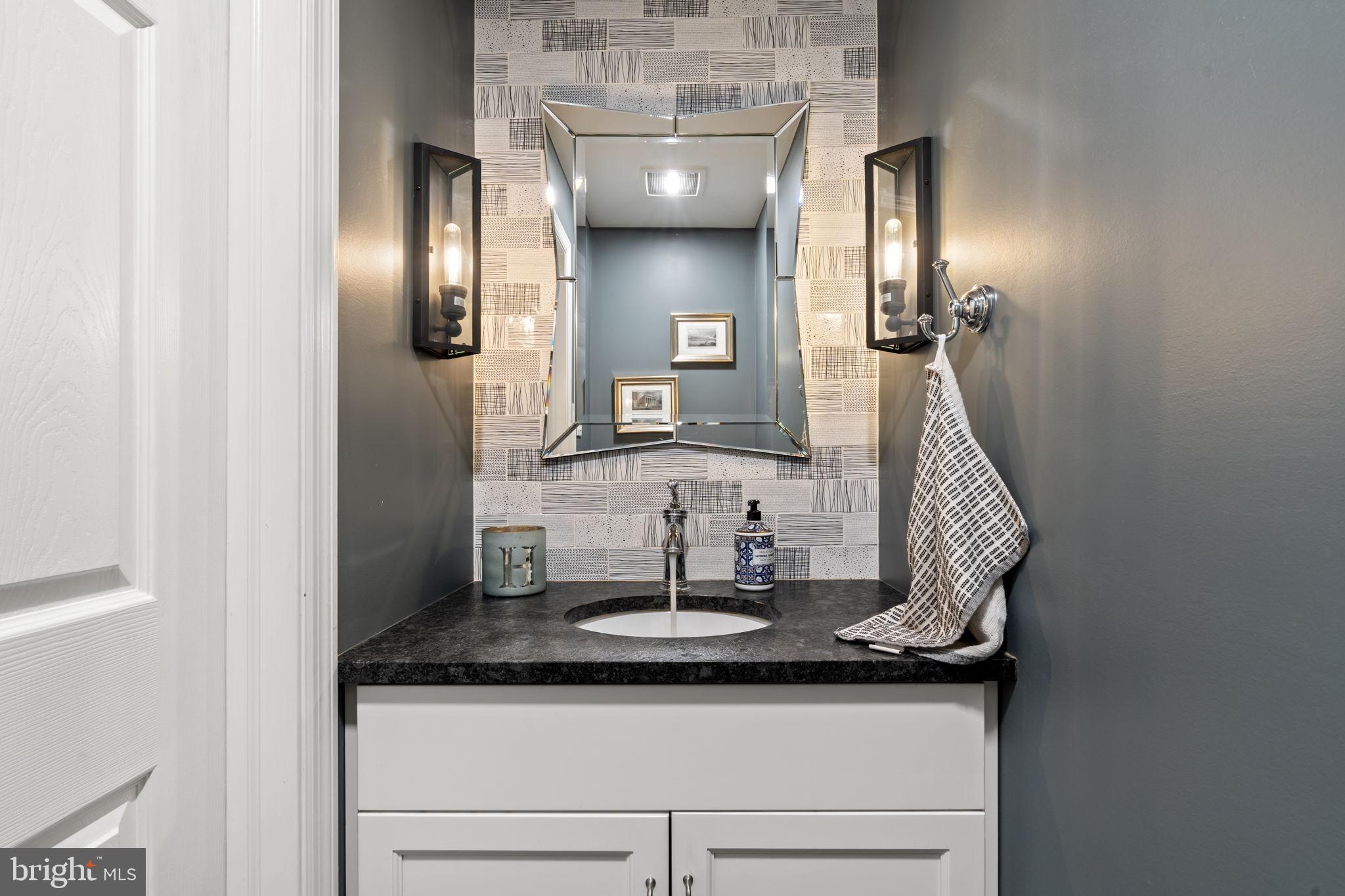 1017 Scholl Road Pottstown, PA 19465 - Photo 21 of 56 a bathroom with a sink and a mirror