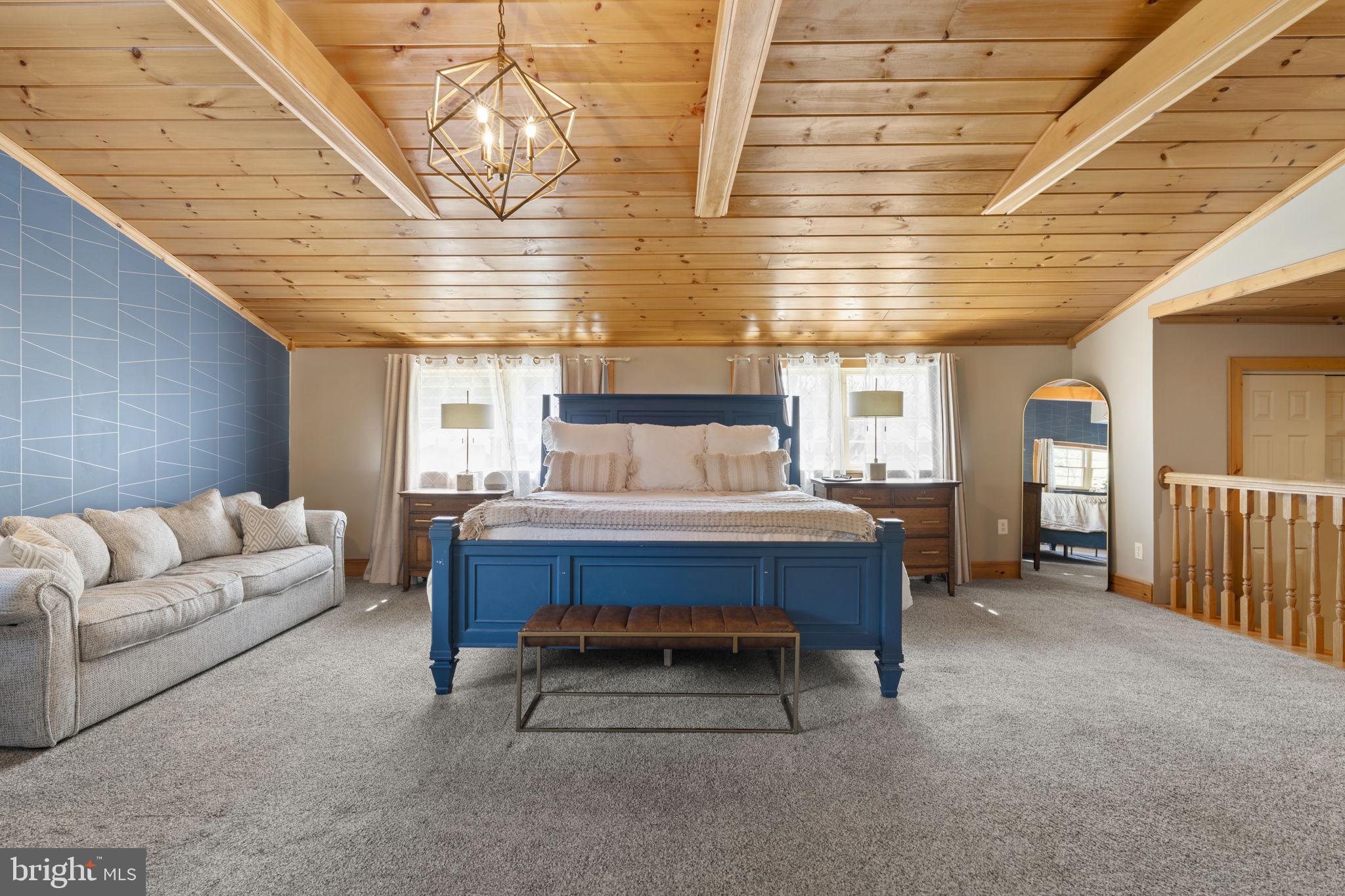 1017 Scholl Road Pottstown, PA 19465 - Photo 23 of 56 a bed room with a bed and a couch