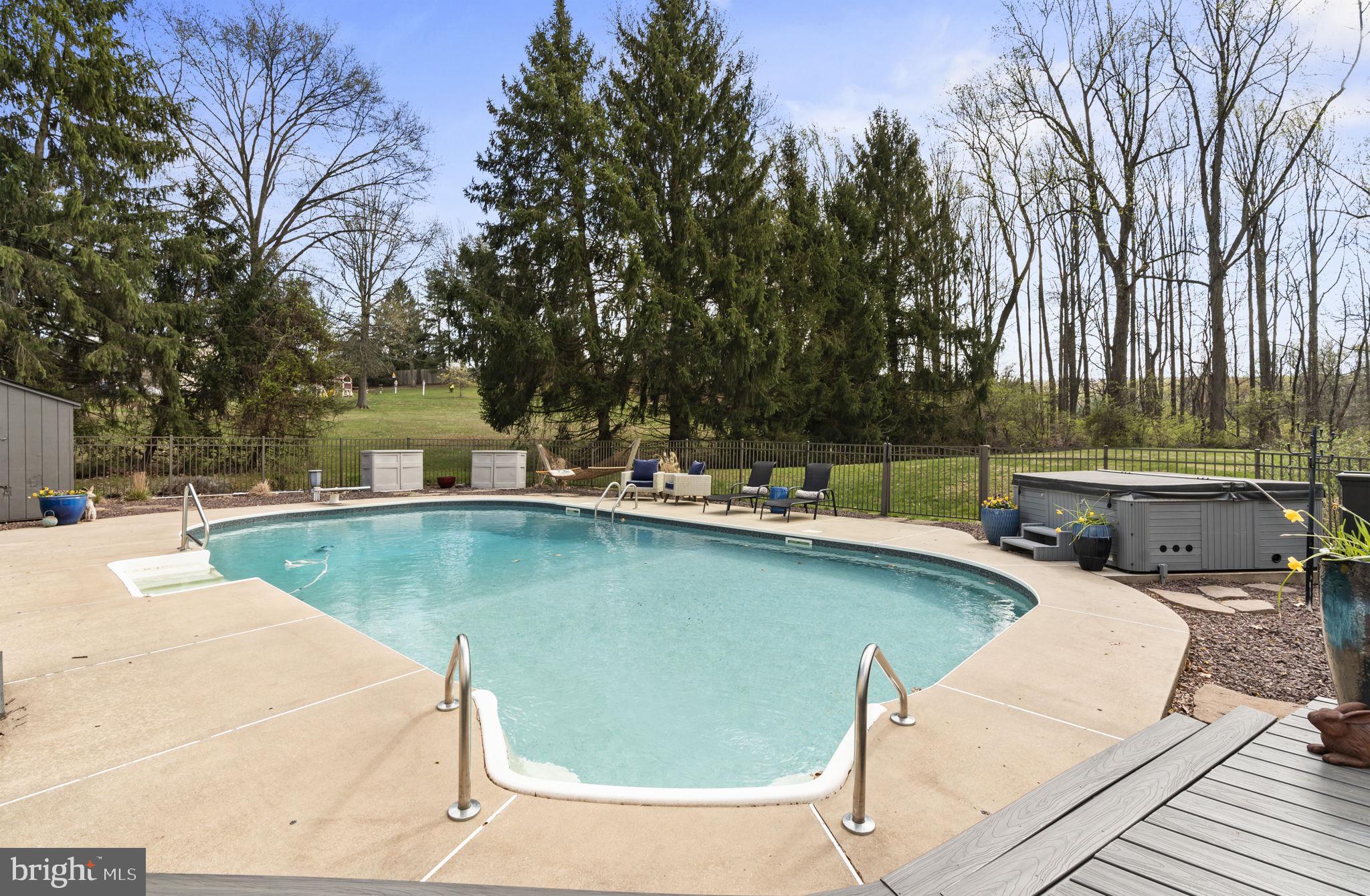 1017 Scholl Road Pottstown, PA 19465 - Photo 43 of 56 a view of a swimming pool with a patio