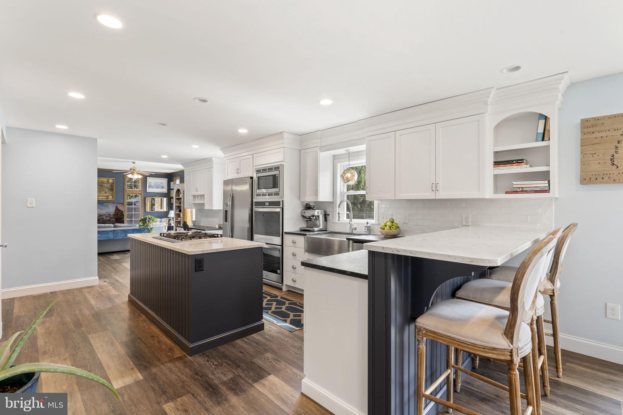 1017 Scholl Road Pottstown, PA 19465 - Photo 8 of 56 a kitchen with a table and chairs in it
