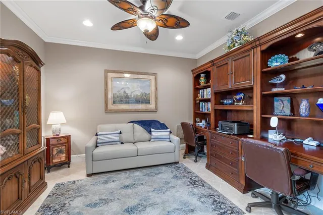a bedroom with bed and window