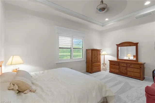 a spacious bathroom with a granite countertop sink mirror and shower