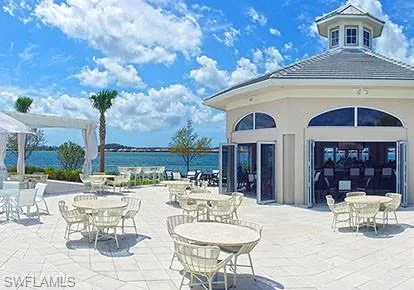 an aerial view of a house with a lake view