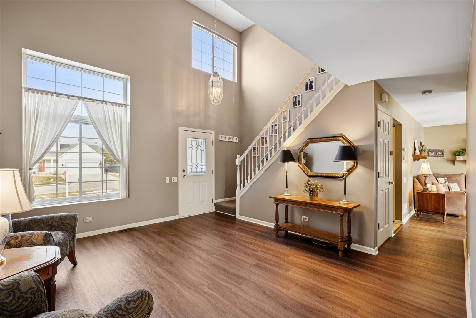1157 Sawmill Lane Algonquin, IL 60102 - Photo 3 of 22 a living room with furniture and a wooden floor