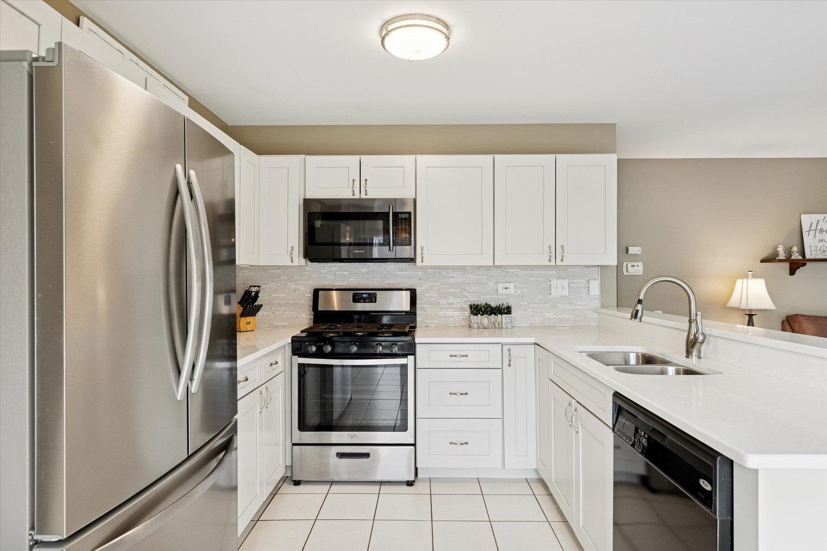 1157 Sawmill Lane Algonquin, IL 60102 - Photo 5 of 22 a kitchen with a sink appliances and cabinets