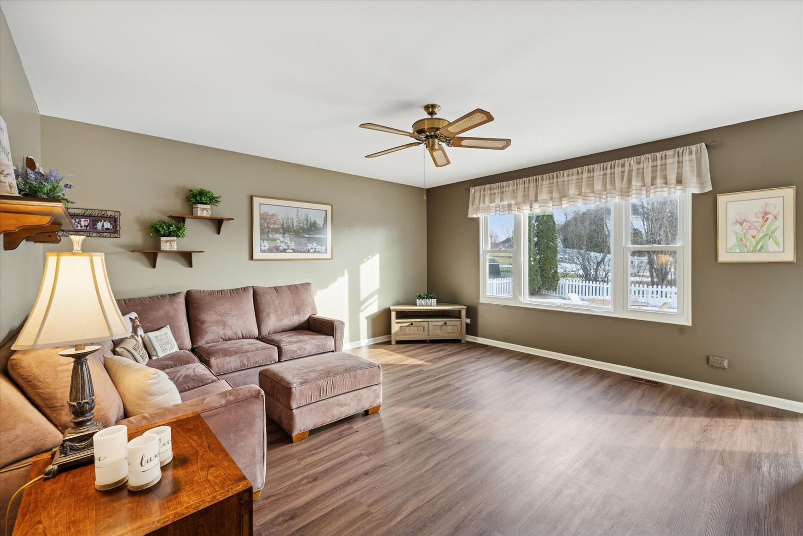 1157 Sawmill Lane Algonquin, IL 60102 - Photo 8 of 22 a living room with furniture and a large window