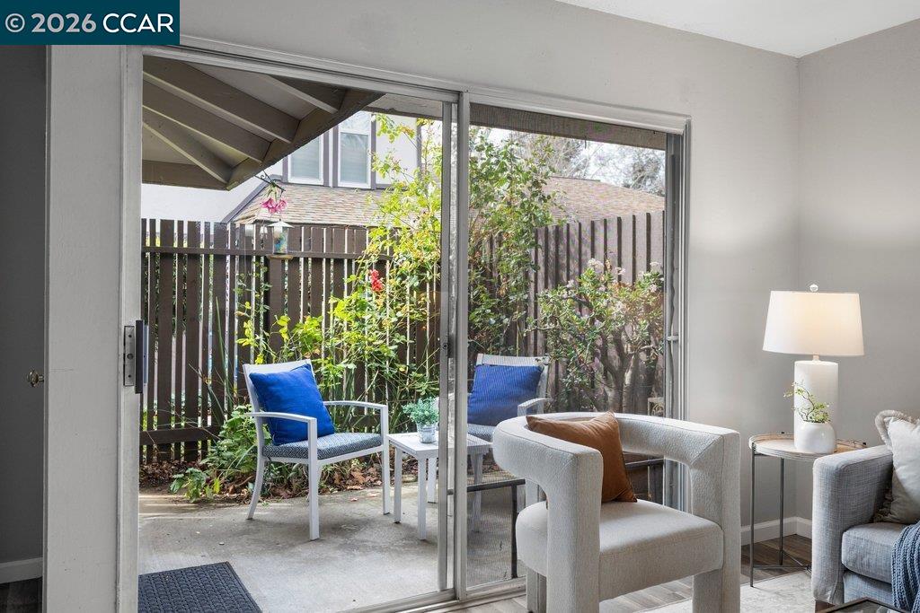 5468 Roundtree Drive, Unit C Concord, CA 94521 - Photo 14 of 27 a view of a dining room with furniture window and outside view