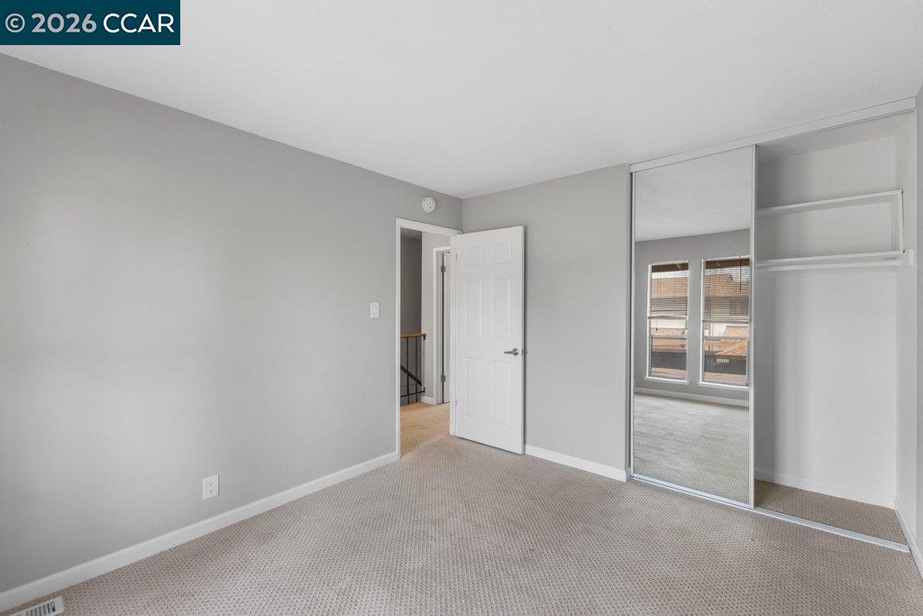 5468 Roundtree Drive, Unit C Concord, CA 94521 - Photo 21 of 27 a view of an empty room
