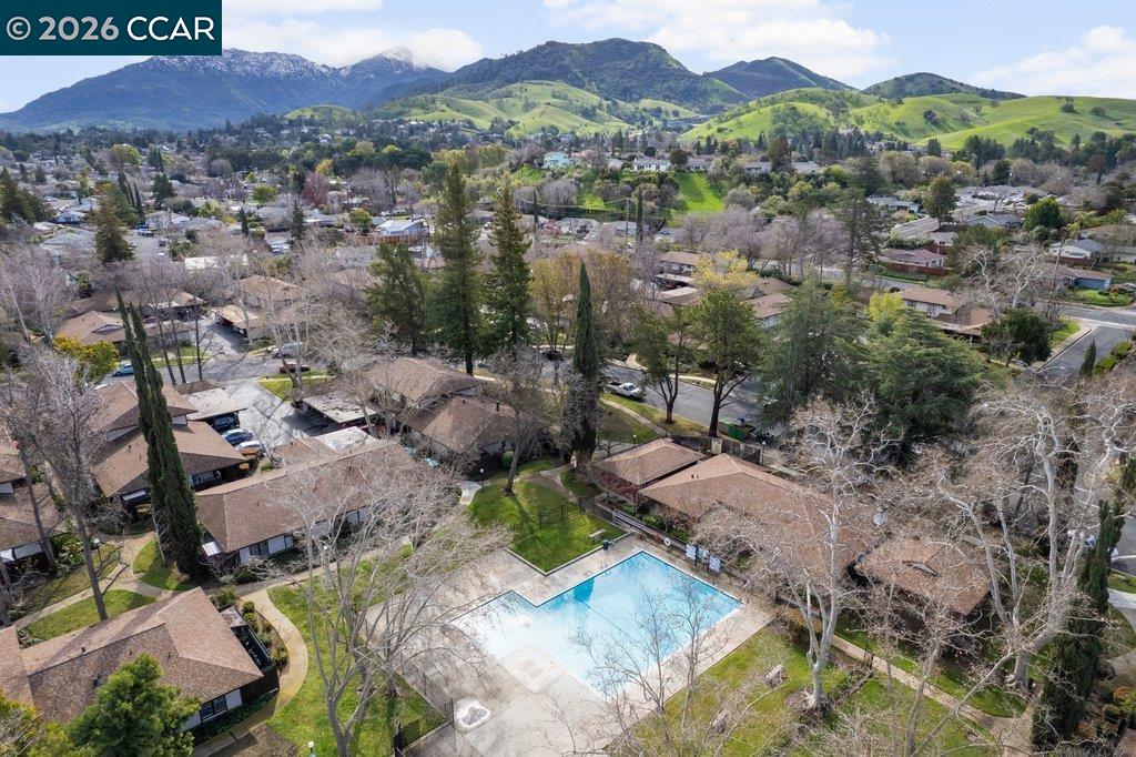 5468 Roundtree Drive, Unit C Concord, CA 94521 - Photo 25 of 27 an aerial view of a city with lots of residential buildings