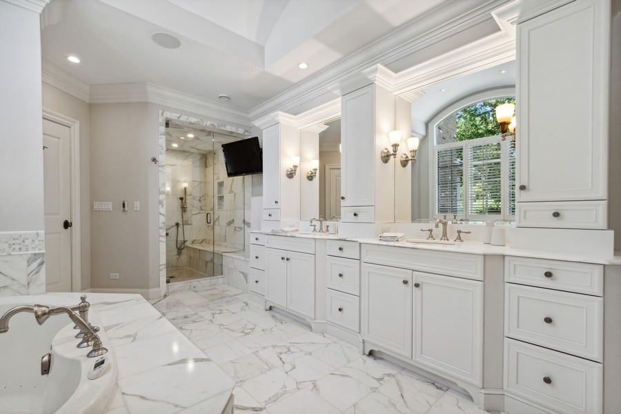 2239 Sheridan Road Highland Park, IL 60035 - Photo 28 of 46 a spacious bathroom with a double vanity sink mirror and double