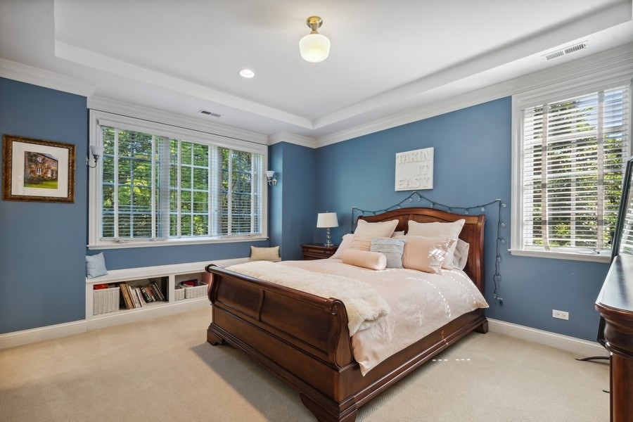 2239 Sheridan Road Highland Park, IL 60035 - Photo 33 of 46 a bedroom with a large bed and a window