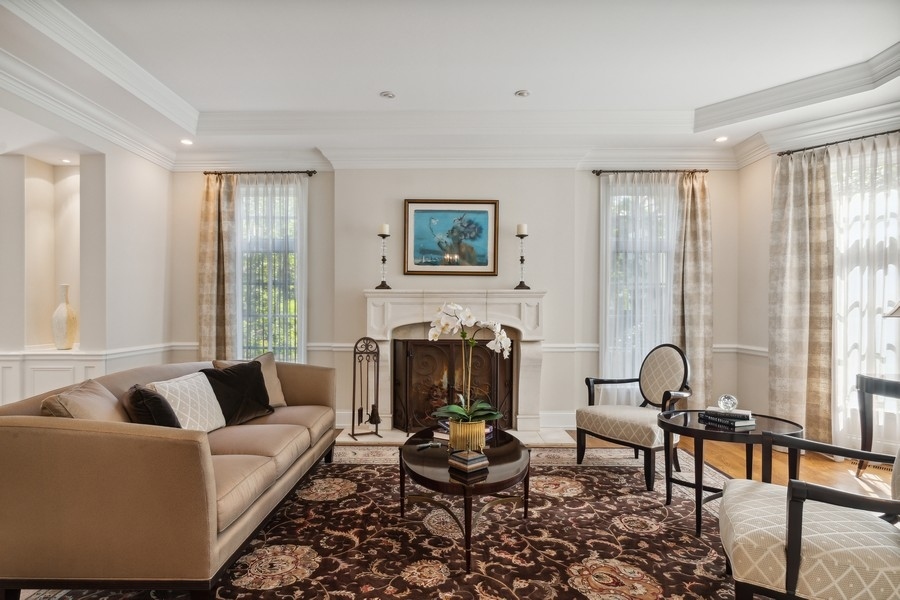 2239 Sheridan Road Highland Park, IL 60035 - Photo 4 of 46 a living room with furniture and a fireplace