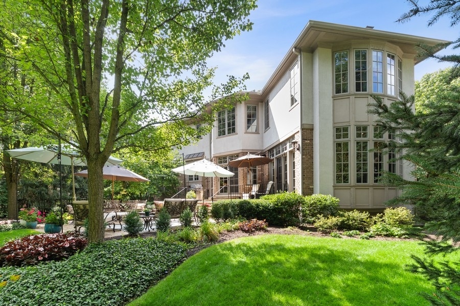 2239 Sheridan Road Highland Park, IL 60035 - Photo 43 of 46 a front view of a house with a yard
