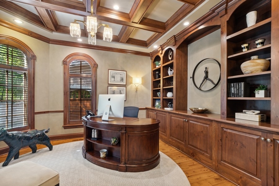2239 Sheridan Road Highland Park, IL 60035 - Photo 5 of 46 a room with lots of wooden furniture and cabinets