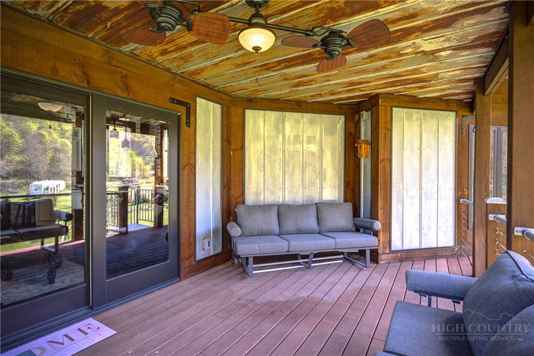 972 West Deep Ford Road Warrensville, NC 28693 - Photo 25 of 36 a living room with furniture and a large window