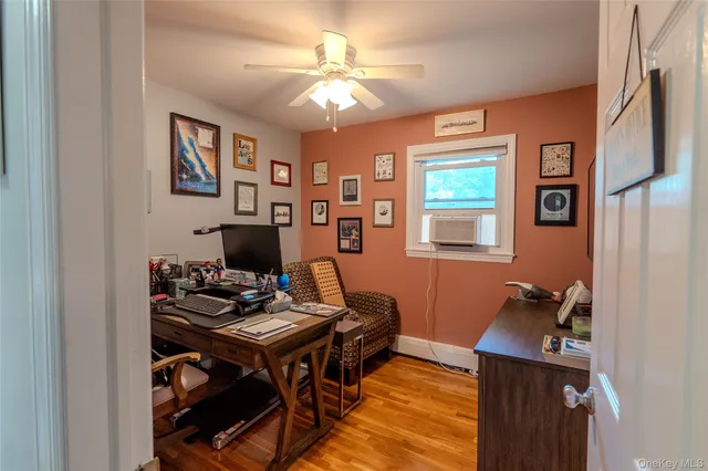 a workspace with furniture and window