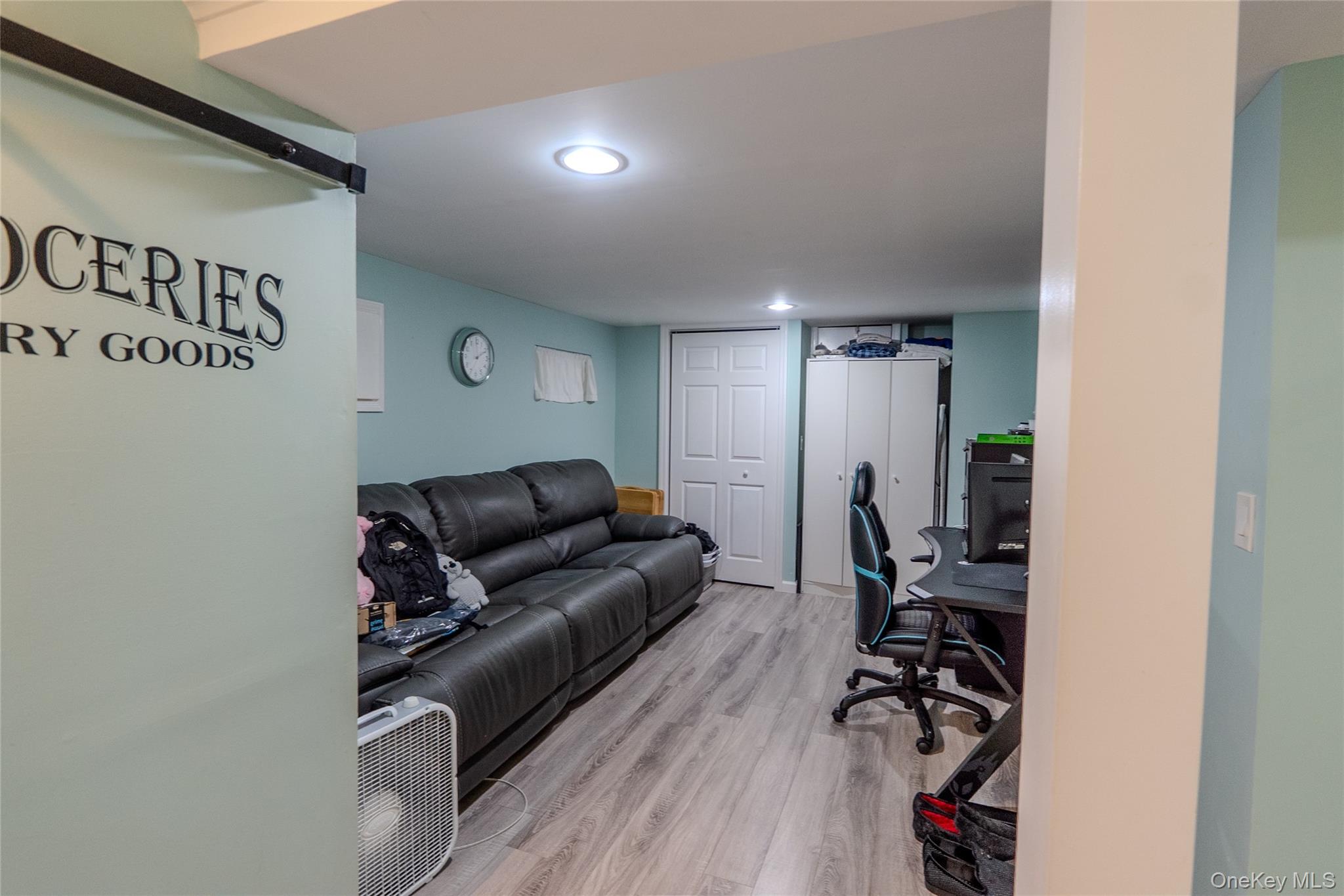 45 Harvard Lane Commack, NY 11725 - Photo 14 of 19 a living room with furniture with wooden floor