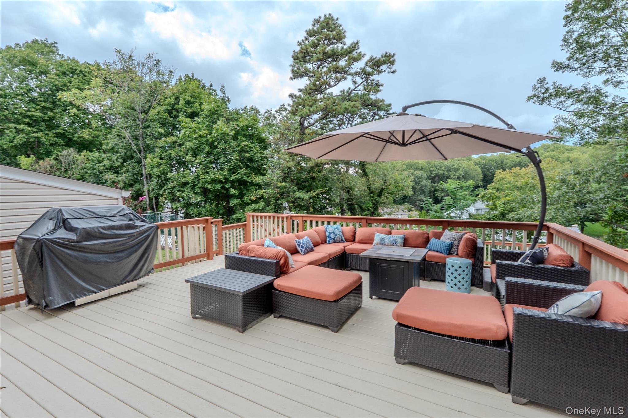45 Harvard Lane Commack, NY 11725 - Photo 15 of 19 a outdoor living room with patio furniture and a potted plant