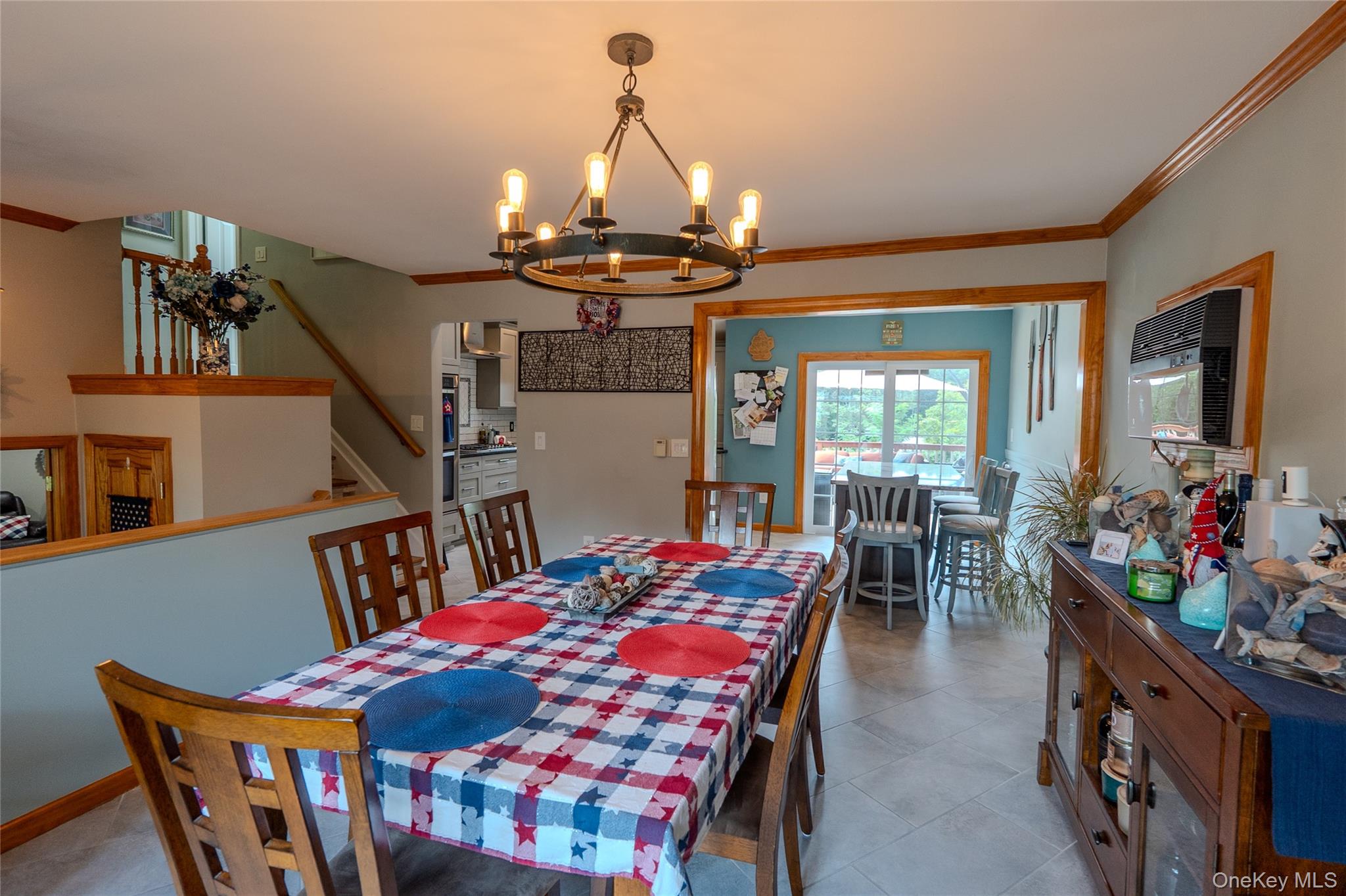 45 Harvard Lane Commack, NY 11725 - Photo 8 of 19 a view of a dining room with furniture and a chandelier
