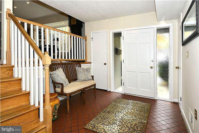 9512 Clement Road Silver Spring, MD 20910 - Photo 2 of 14 a living room with furniture and a rug