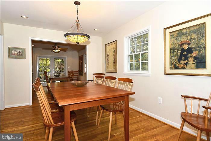 9512 Clement Road Silver Spring, MD 20910 - Photo 4 of 14 a view of a dining room with furniture window and wooden floor