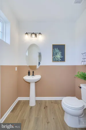 a kitchen with stainless steel appliances granite countertop a sink refrigerator and microwave