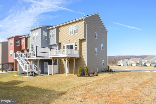 a front view of a building with many windows