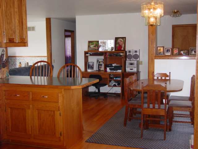 455 West Wellman Line Road Melvin, MI 48454 - Photo 4 of 20 This is a view of the dining area in the kitchen.