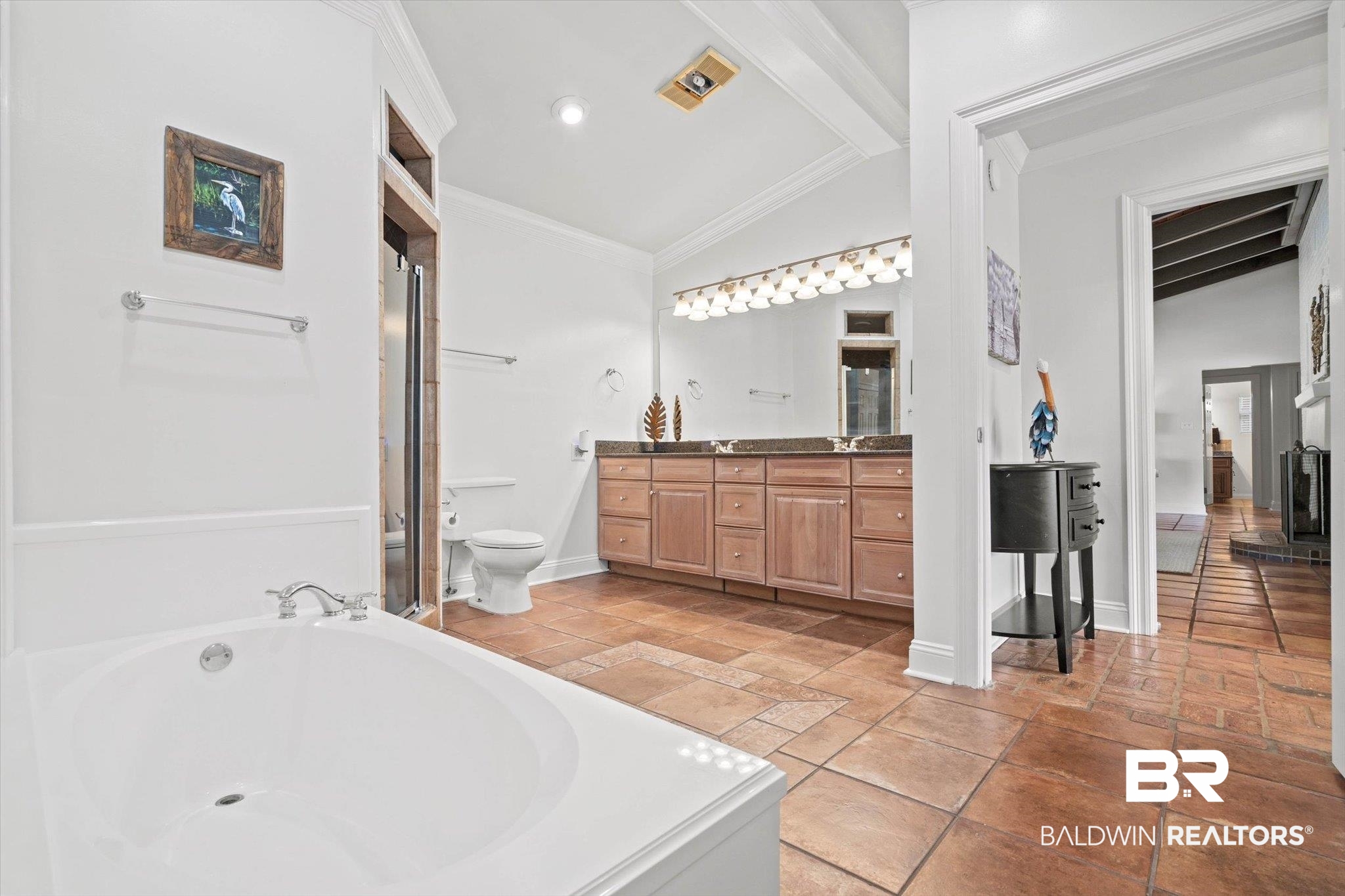 3720 Rabbit Creek Court Theodore, AL 36582 - Photo 12 of 47 Bathroom featuring vaulted ceiling, a garden tub, crown molding, vanity, and recessed lighting