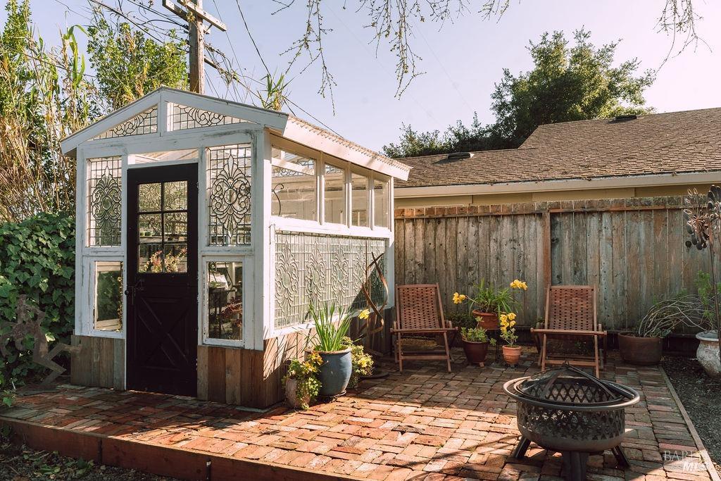 1108 Ferris Drive Novato, CA 94945 - Photo 16 of 24 a view of a patio with table and chairs and potted plants