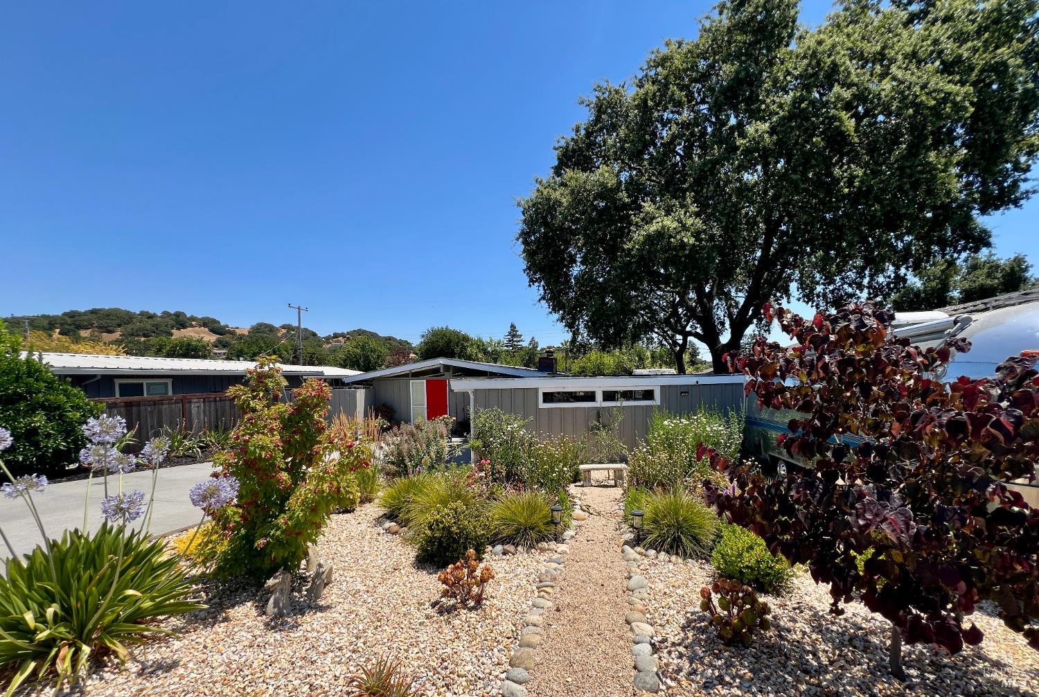 1108 Ferris Drive Novato, CA 94945 - Photo 2 of 24 a view of a lake with a house in the background